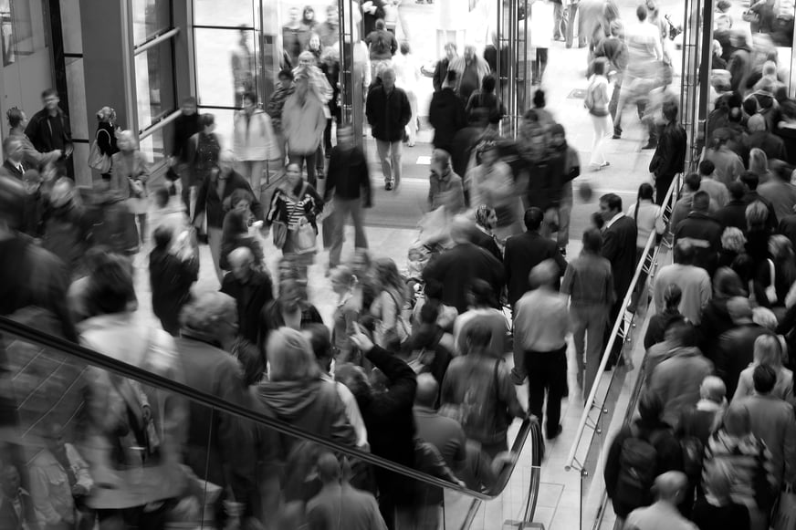 Busy crowds in mall, black and white, analysing customer behaviour