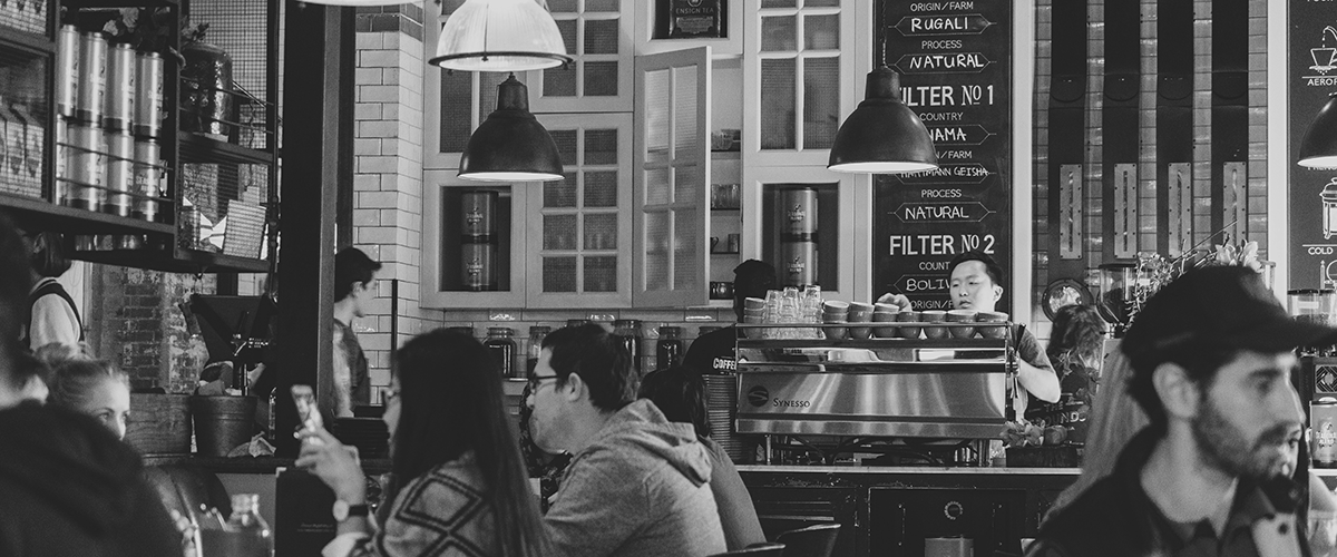 people eating food at a cafe outlet